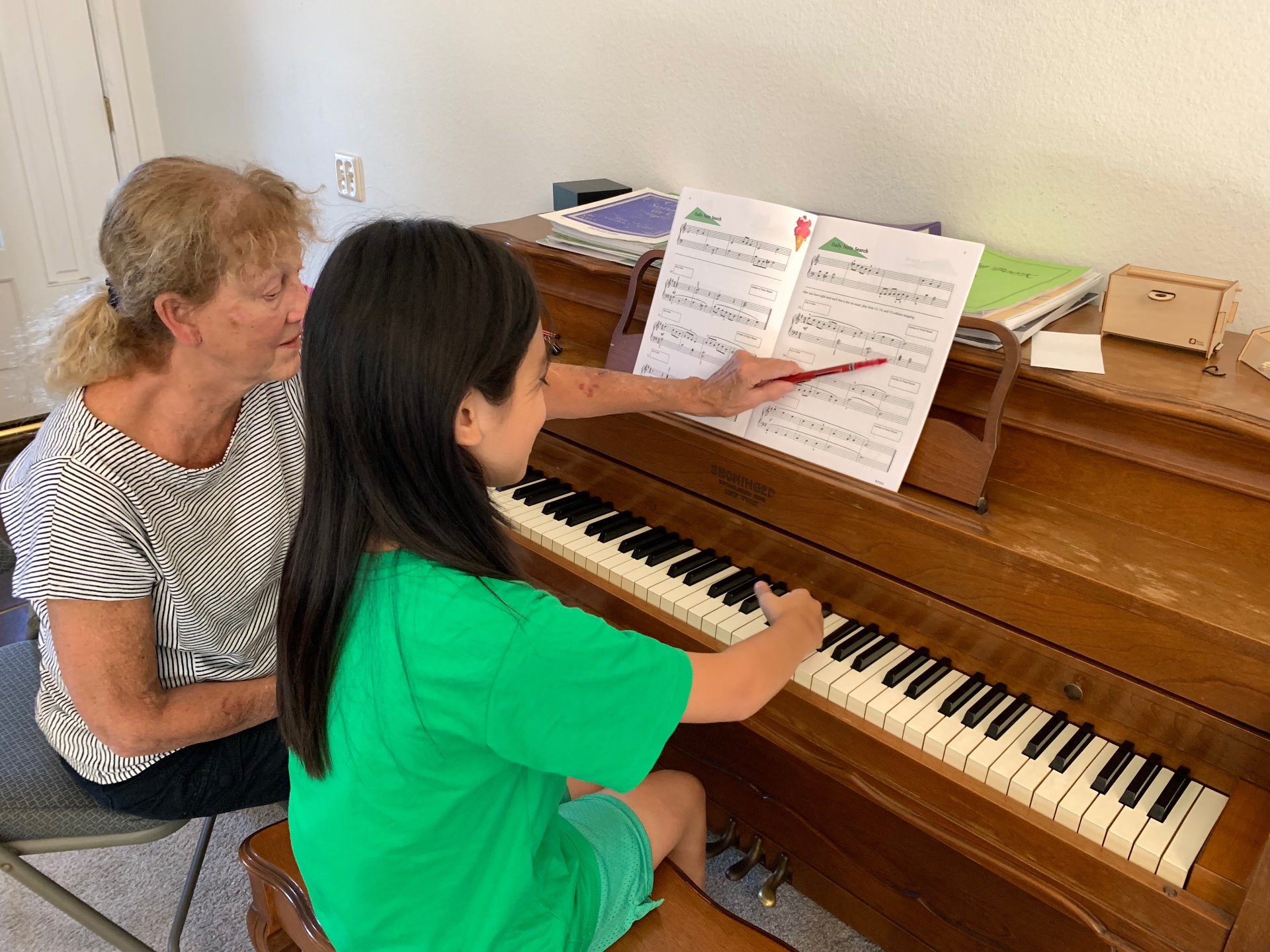 Student practicing scales at the piano